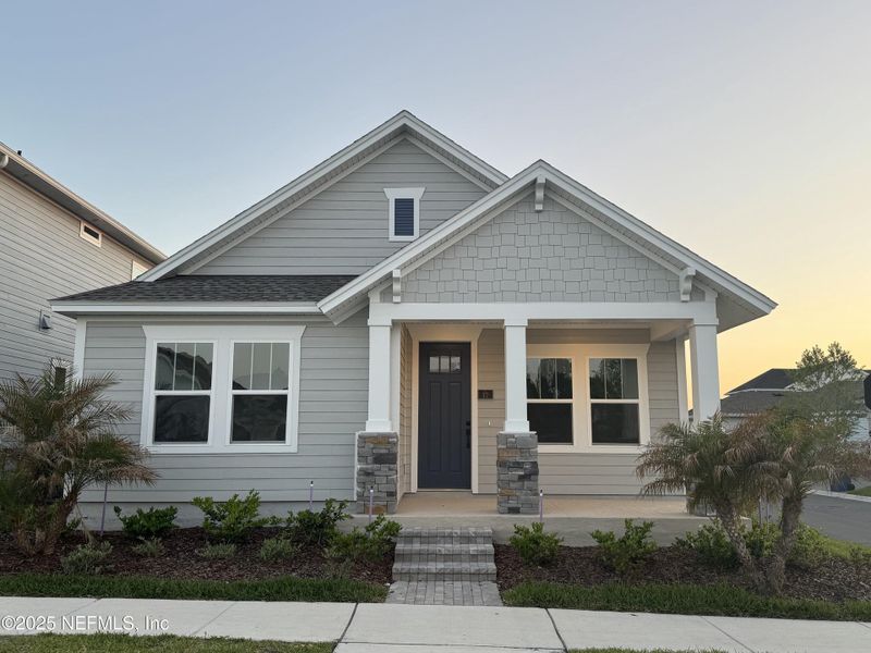 Front exterior of a new home in Brookside at Shearwater, St. Augustine, FL, highlighting curb appeal (Image 1). Front exterior of a new home in Brookside at Shearwater, St. Augustine, FL, highlighting curb appeal (Image 1).