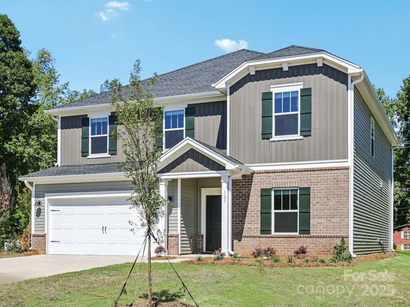 Front exterior of a new home in Nelson's Creek, Mocksville, NC, highlighting curb appeal (Image 14). Front exterior of a new home in Nelson's Creek, Mocksville, NC, highlighting curb appeal (Image 14).