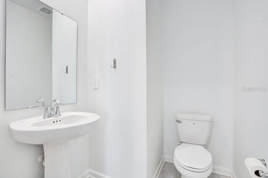 Furnished interior view inside a new home in Wellness Ridge, Clermont (Image 13).