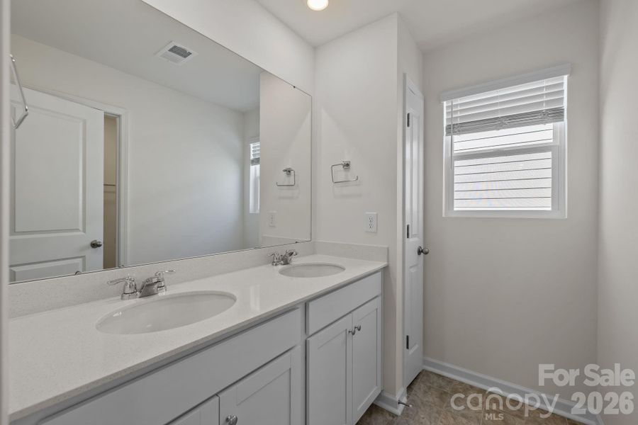 Furnished interior view inside a new home in McFarland Estates, York (Image 9).