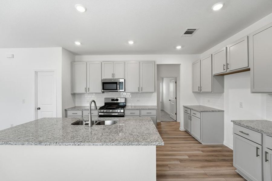 Furnished interior view inside a new home in Longview, Del Valle (Image 8).