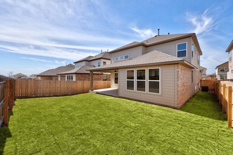 Exterior details and patio area of a home in University Heights, Round Rock (Image 27).