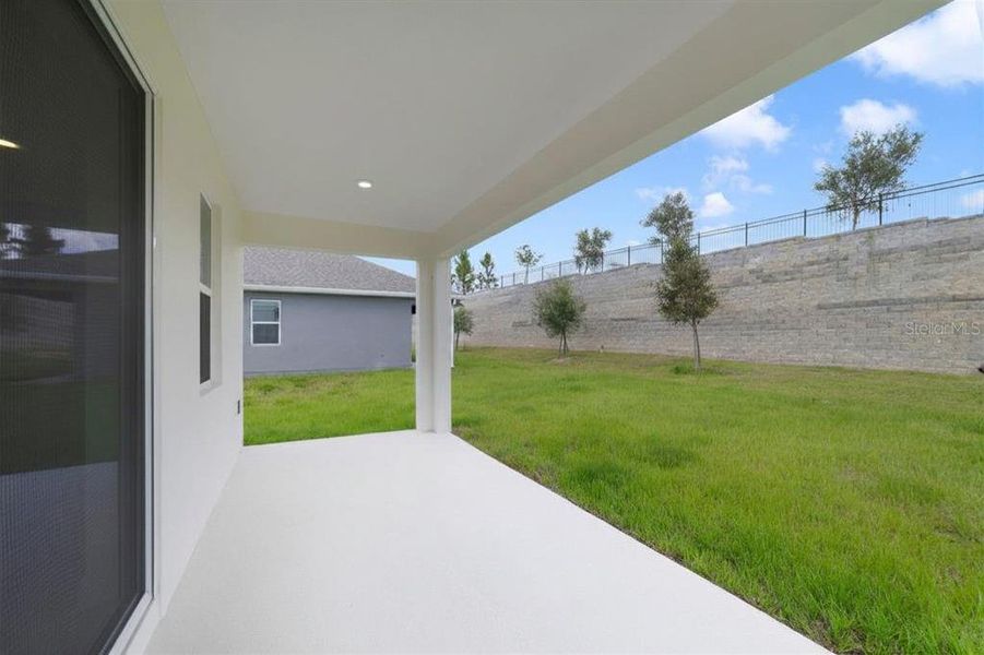 Exterior details and patio area of a home in Vintner Reserve, Clermont (Image 22).