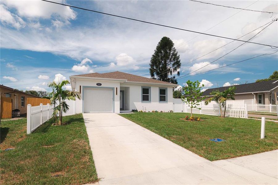 Front exterior of a new home in , Tampa, FL, highlighting curb appeal (Image 25). Front exterior of a new home in , Tampa, FL, highlighting curb appeal (Image 25).