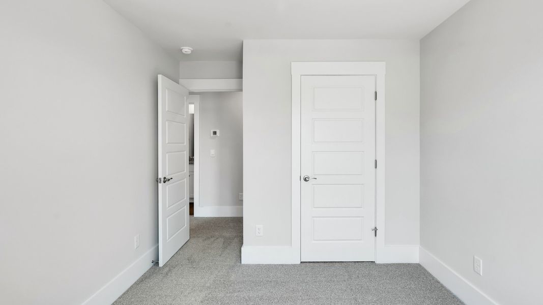 Spacious, unfurnished interior of a new home in The Pines at Blake Farm, Wilmington (Image 25).