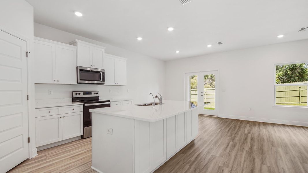 Representative unfurnished interior of a home built from the Carol by D.R. Horton in Holley Grove at Peach Creek, Santa Rosa Beach (Image 8).