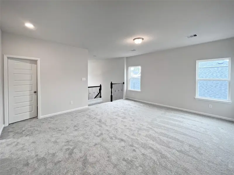 The Sparrow II- Game Room Upstairs. Home under construction. Sample floor plan photo used for illustrative purposes only. Upgrades, selections options, windows and colors may vary.