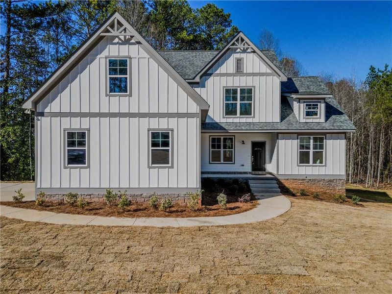 Front exterior of a new home in , Villa Rica, GA, highlighting curb appeal (Image 1). Front exterior of a new home in , Villa Rica, GA, highlighting curb appeal (Image 1).