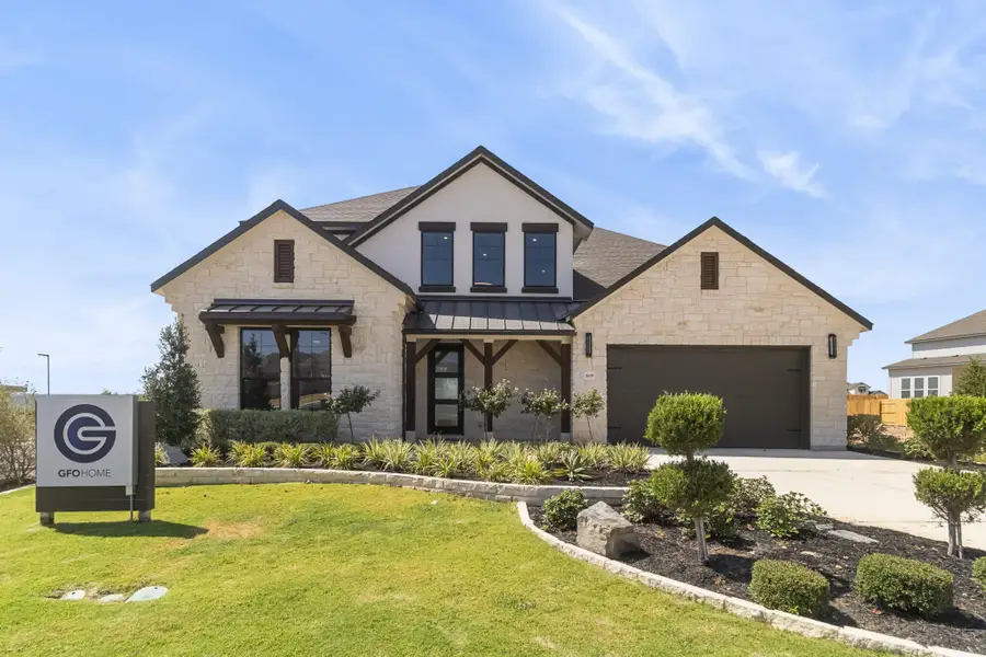 Front exterior of a new home in Crescent Bluff, Georgetown, TX, highlighting curb appeal (Image 1). Front exterior of a new home in Crescent Bluff, Georgetown, TX, highlighting curb appeal (Image 1).