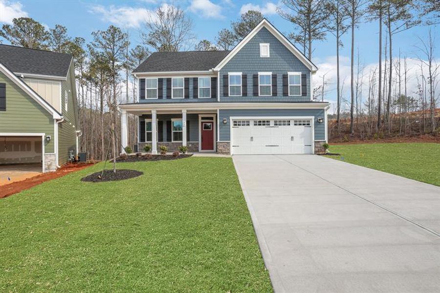 Front exterior of a new home in Crystal Falls, Dawsonville, GA, highlighting curb appeal (Image 2).