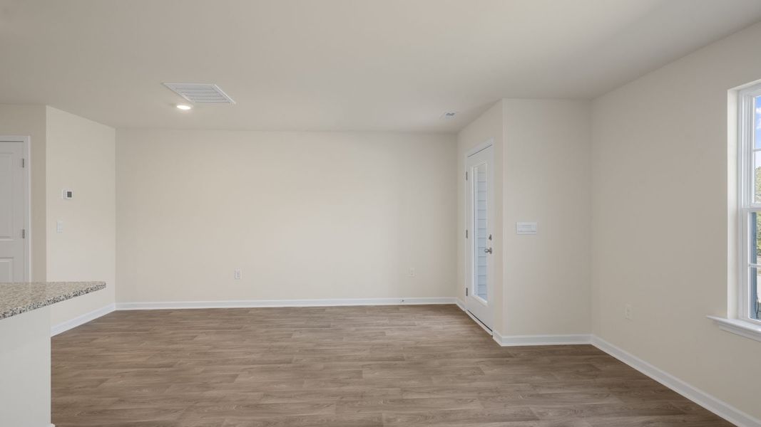 Representative unfurnished interior of a home built from the Pearson by D.R. Horton in The Townes at Ridgewood Farms, Winterville (Image 18).