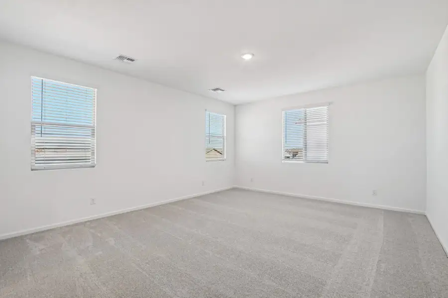 Primary suite. Finishes and options may vary by community