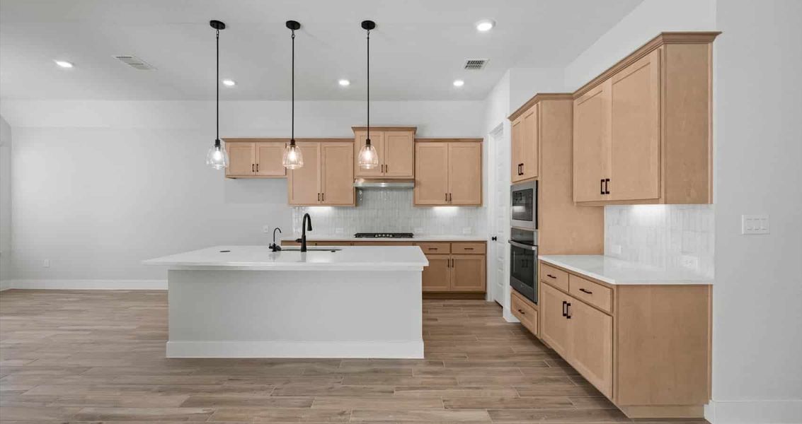 Furnished interior view inside a new home in 6 Creeks, Kyle (Image 3). Furnished interior view inside a new home in 6 Creeks, Kyle (Image 3).