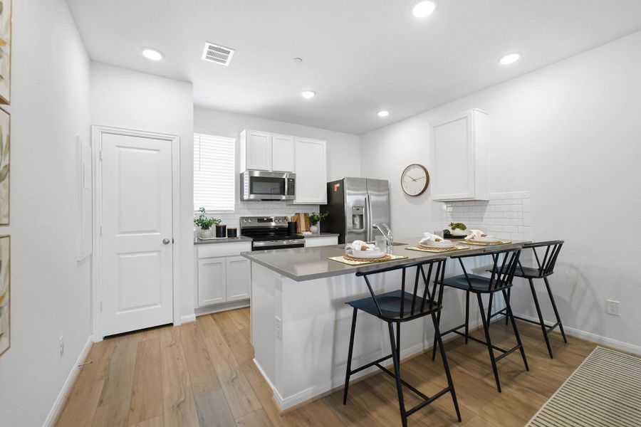 Furnished interior view inside a new home in Municipal Drive Townhomes, Leander (Image 14).