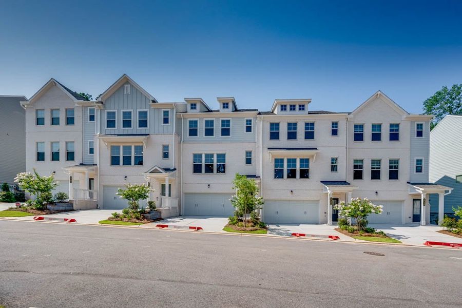 Front exterior of a new home in Hampton Trace, Mableton, GA, highlighting curb appeal (Image 1). Front exterior of a new home in Hampton Trace, Mableton, GA, highlighting curb appeal (Image 1).