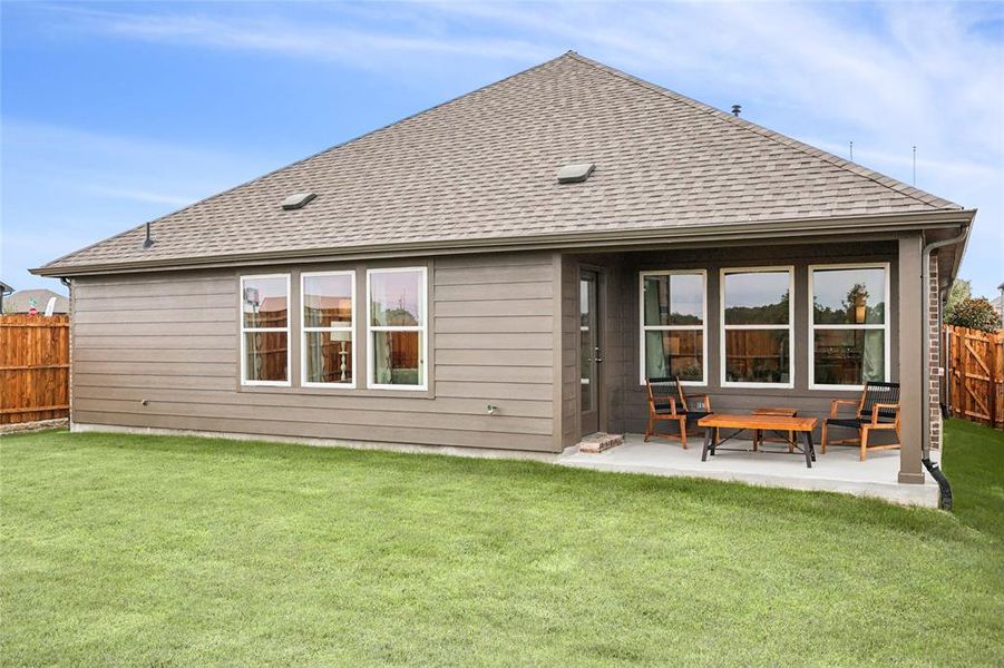 Exterior details and patio area of a home in Simpson Crossing, Princeton (Image 2). Exterior details and patio area of a home in Simpson Crossing, Princeton (Image 2).