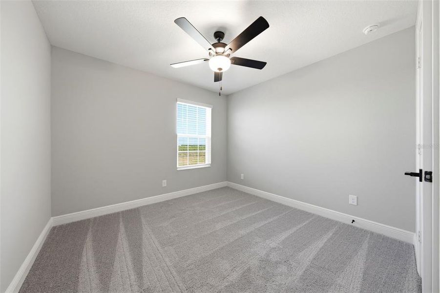 Spacious, unfurnished interior of a new home in Gum Lake Preserve, Lake Alfred (Image 42).