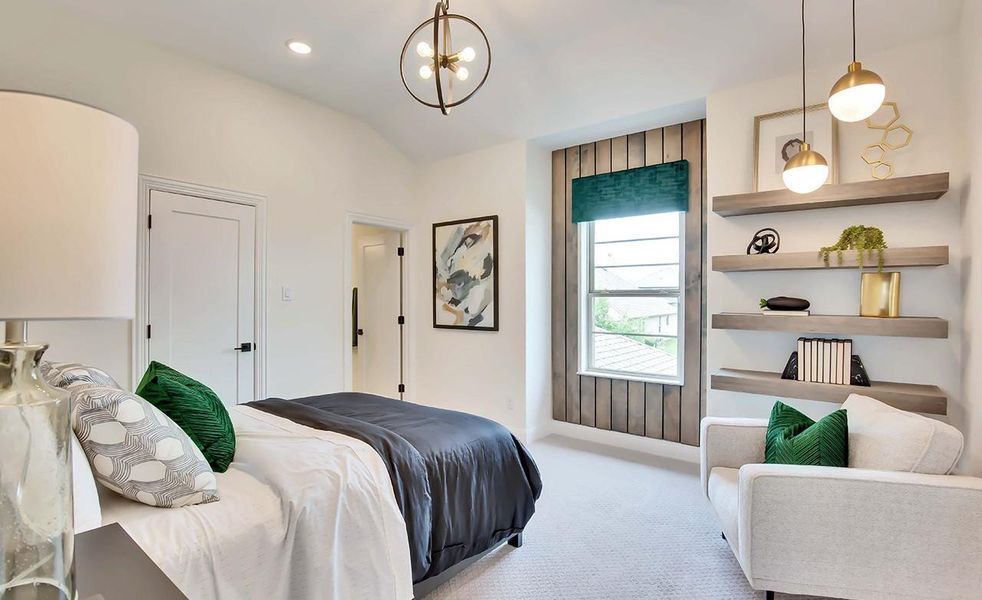 Carpeted bedroom featuring a chandelier and recessed lighting
