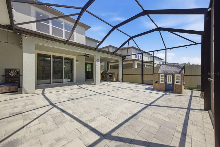 Exterior details and patio area of a home in Whispering Oaks Preserve, Wesley Chapel (Image 34). Exterior details and patio area of a home in Whispering Oaks Preserve, Wesley Chapel (Image 34).