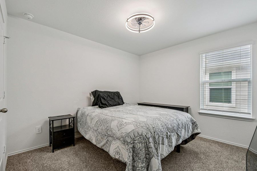Bedroom featuring carpet floors