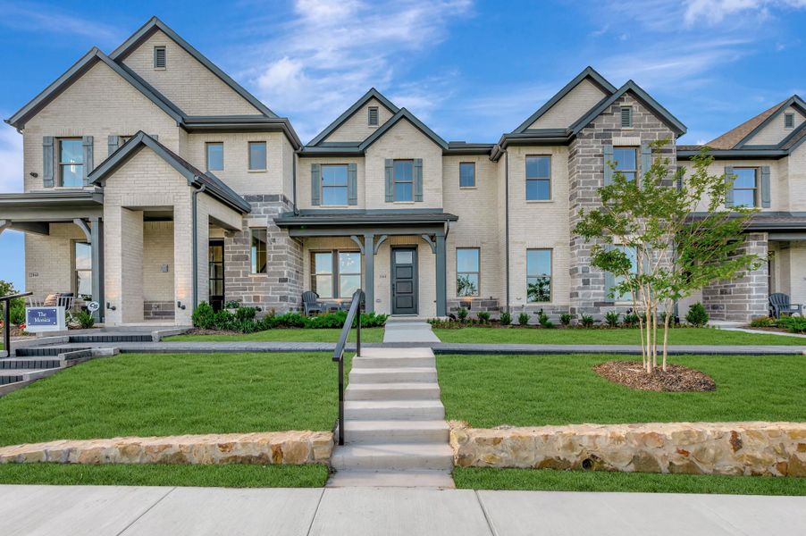 Front exterior of a new home in Ridgeline Towns, McKinney, TX, highlighting curb appeal (Image 1). Front exterior of a new home in Ridgeline Towns, McKinney, TX, highlighting curb appeal (Image 1).