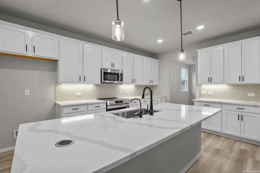 Furnished interior view inside a new home in Hannah Heights, Seguin (Image 12).