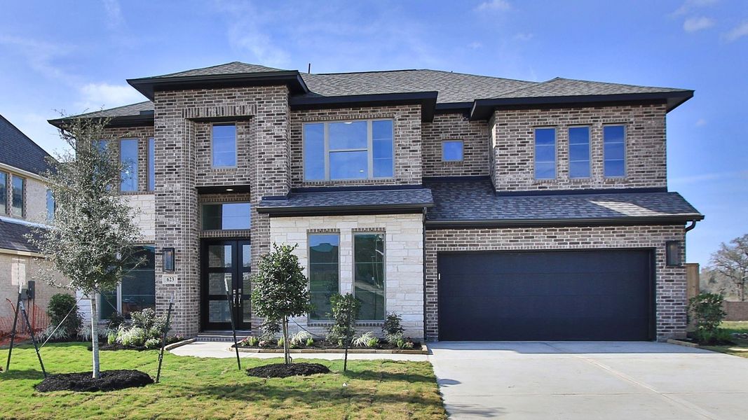 Front exterior of a new home in Briarley, Montgomery, TX, highlighting curb appeal (Image 16). Front exterior of a new home in Briarley, Montgomery, TX, highlighting curb appeal (Image 16).
