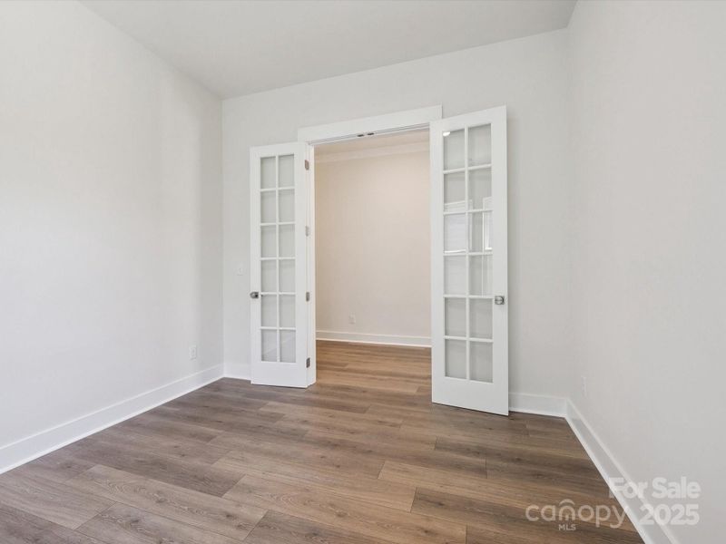 Spacious, unfurnished interior of a new home in North Creek Village, Huntersville (Image 33).