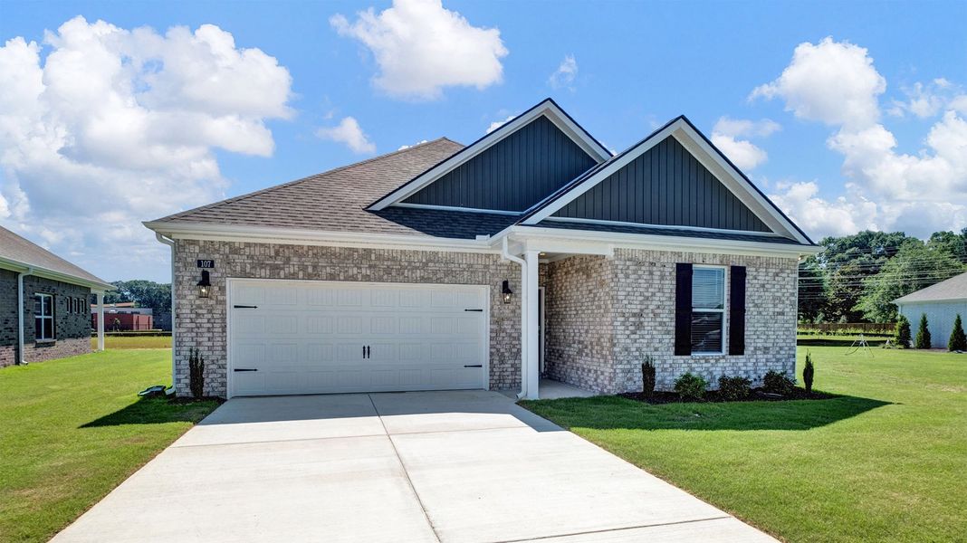 Front exterior of a new home in Shiloh Springs, Jackson, TN, highlighting curb appeal (Image 2). Front exterior of a new home in Shiloh Springs, Jackson, TN, highlighting curb appeal (Image 2).
