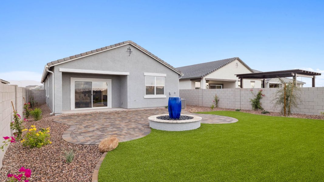 Exterior details and patio area of a home in Radiance at Superstition Vistas, Apache Junction (Image 19).