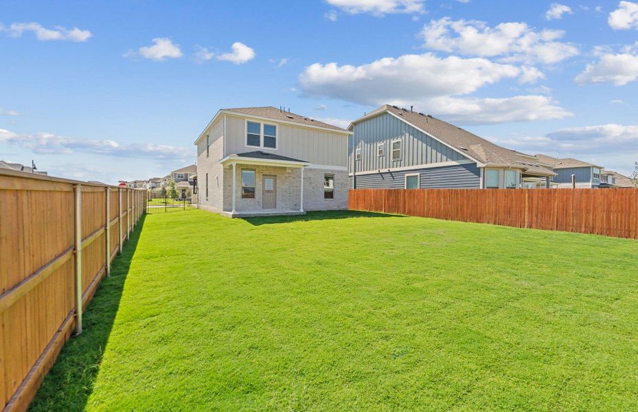 Exterior details and patio area of a home in Santa Rita Ranch, Liberty Hill (Image 20). Exterior details and patio area of a home in Santa Rita Ranch, Liberty Hill (Image 20).