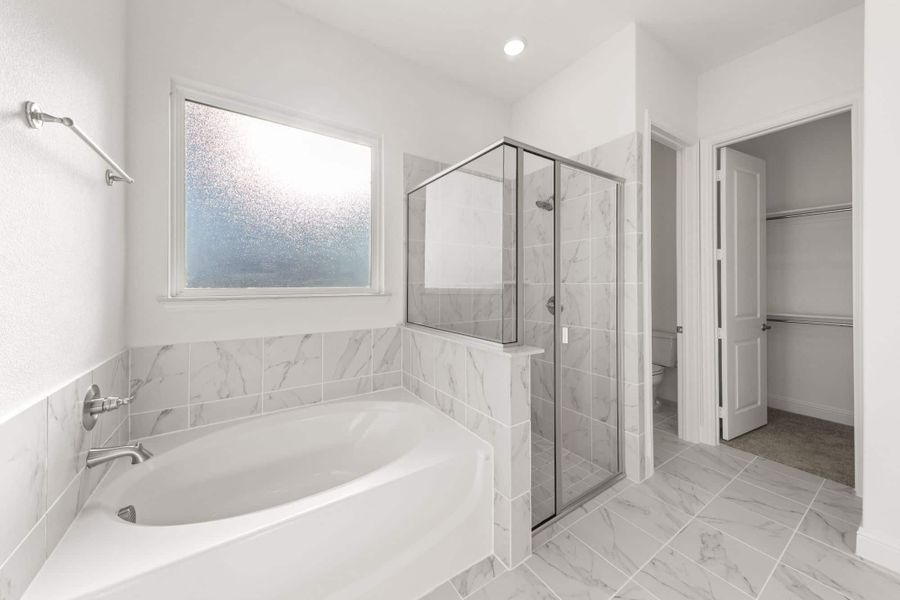 Representative furnished interior of a home built from the Belton by UnionMain Homes in Lake Breeze, Lavon (Image 11).