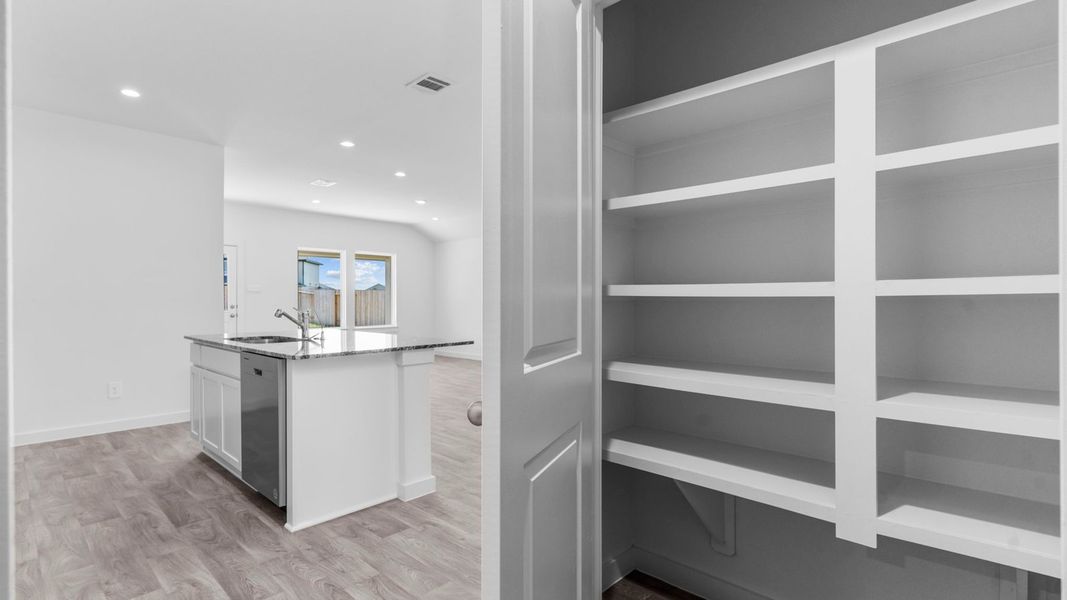 Furnished interior view inside a new home in Tamarron, Fulshear (Image 13).