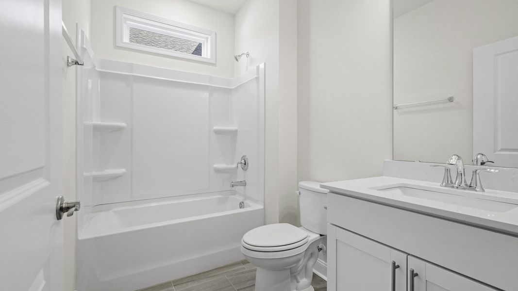 Furnished interior view inside a new home in The Villas at Kinsley, Jamestown (Image 4).