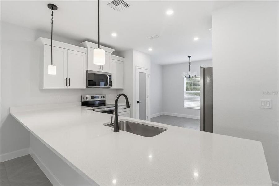 Furnished interior view inside a new home in , Dunnellon (Image 11).
