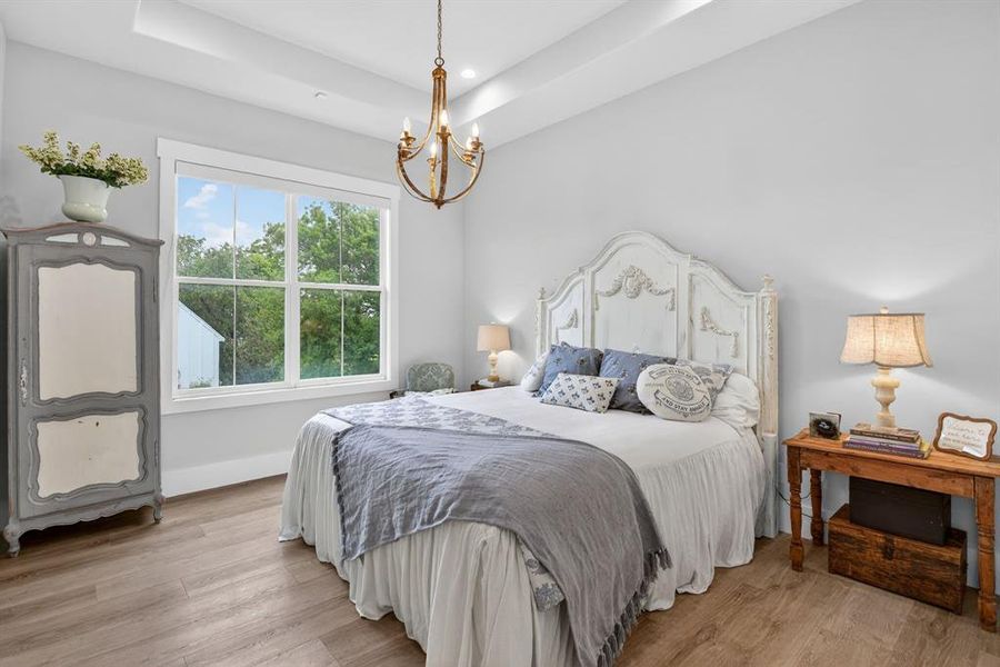 One of the en-suite guest rooms that was designed to capture the lake view. 4 full en-suite bedrooms on the first floor with the 8-bunk room upstairs over one of the garages.