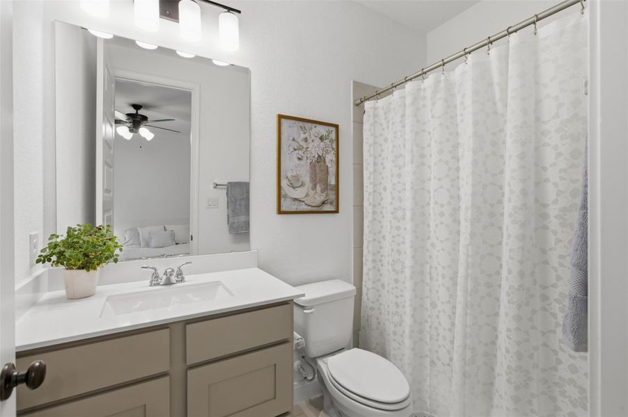 Furnished interior view inside a new home in Wolf Ranch, Georgetown (Image 26).