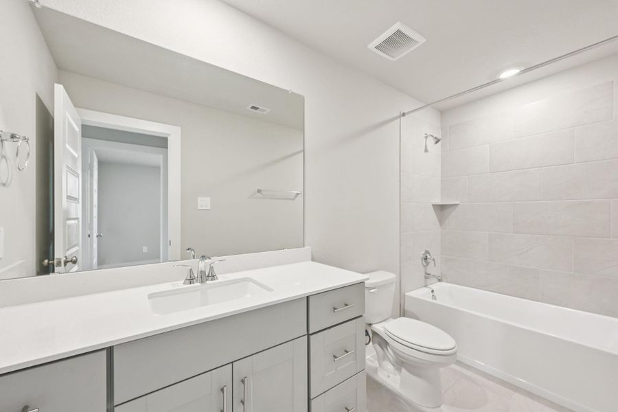 Furnished interior view inside a new home in Landing Meadows - Premier Series, New Caney (Image 10).