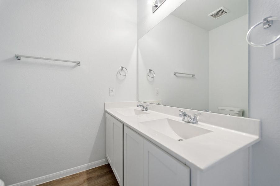 Furnished interior view inside a new home in The Pines at Seven Coves, Willis (Image 8).