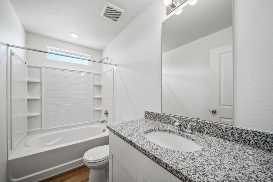 Furnished interior view inside a new home in Reunion, Commerce City (Image 12).