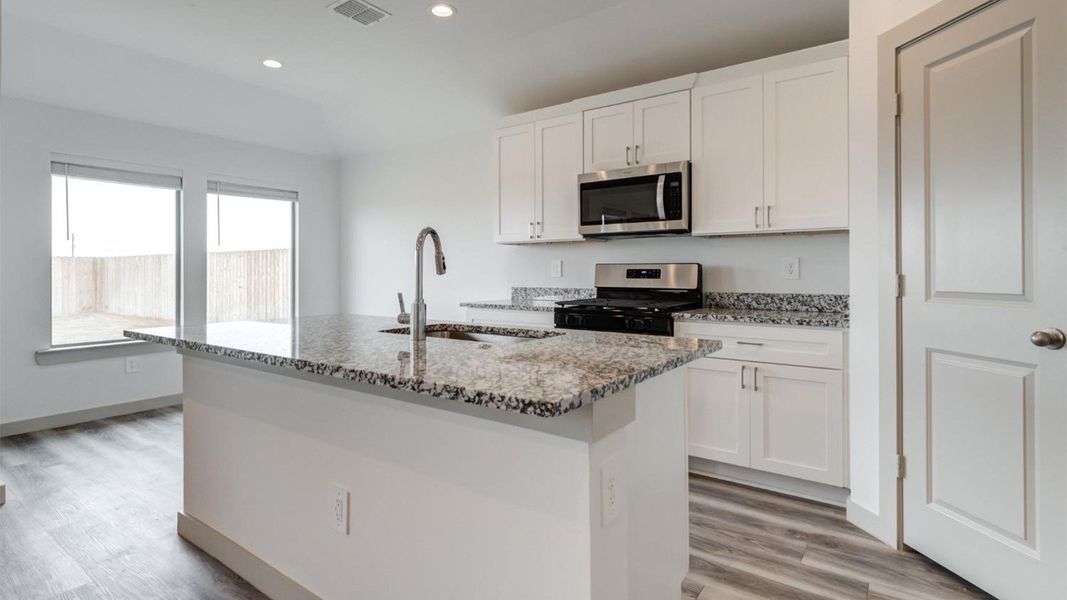 Representative furnished interior of a home built from the The Ashburn by D.R. Horton in Allen Farms, Lubbock (Image 10).