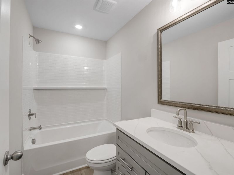 Furnished interior view inside a new home in Collins Cove, Chapin (Image 12). Furnished interior view inside a new home in Collins Cove, Chapin (Image 12).