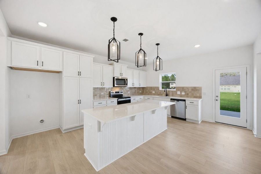 Furnished interior view inside a new home in Reeves Crossing, St. George (Image 4).