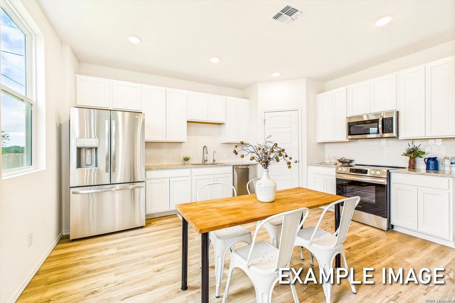 Furnished interior view inside a new home in Applewhite Meadows, San Antonio (Image 4).