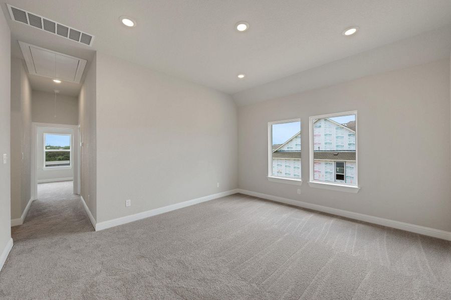 Spare room featuring attic access, light colored carpet, and recessed lighting Spare room featuring attic access, light colored carpet, and recessed lighting