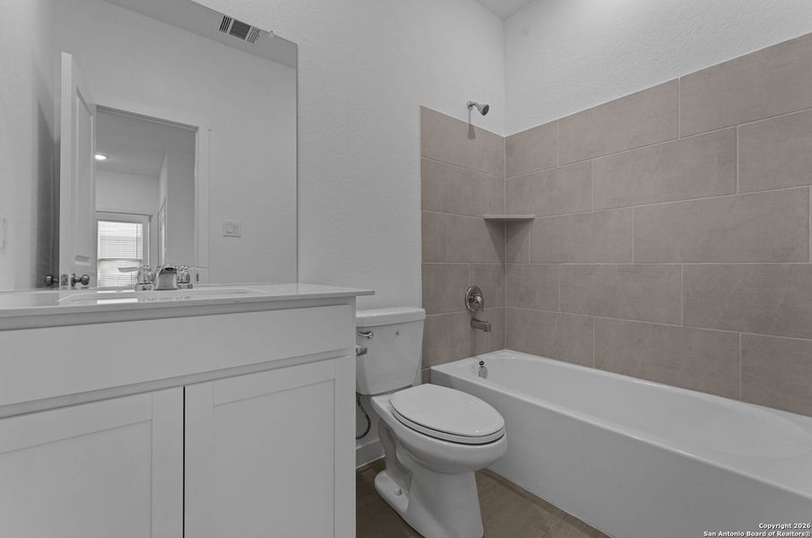 Furnished interior view inside a new home in , New Braunfels (Image 11).