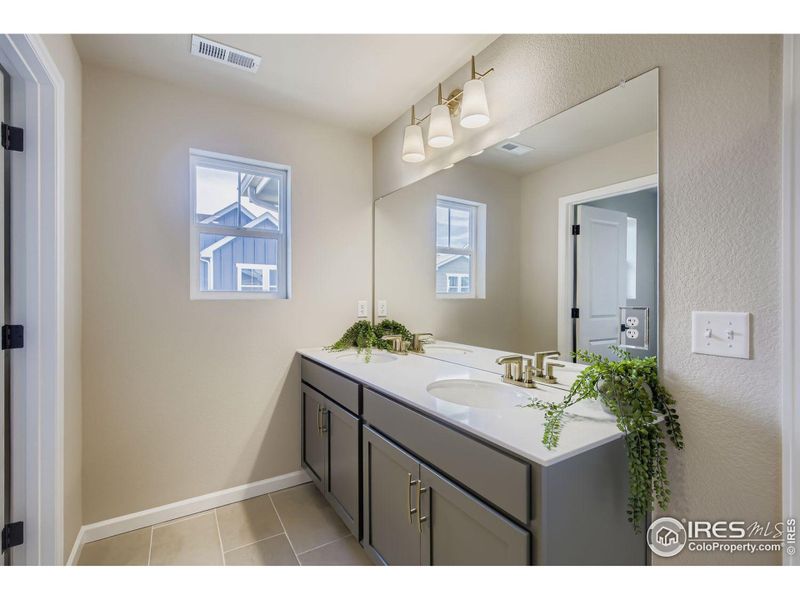 Dual vanities in the primary bathroom
