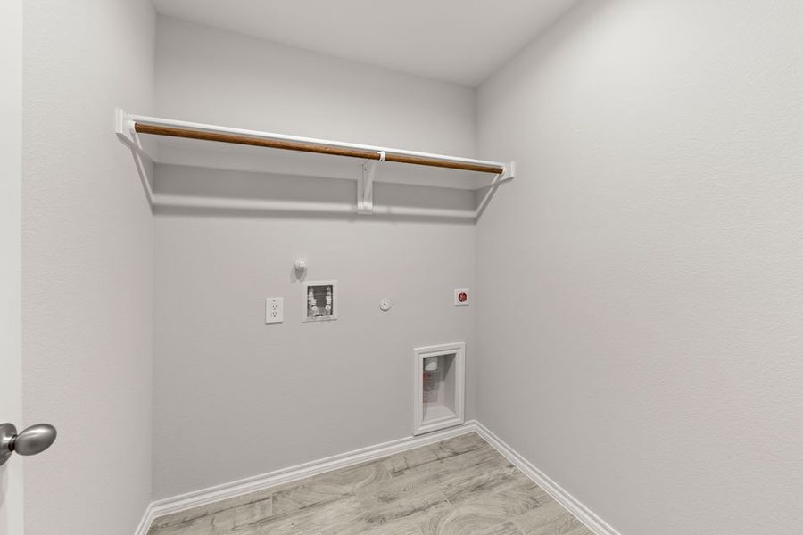 Representative exterior photo of a completed home built from the Boston by Impression Homes in Keeneland, Aubrey, TX (Image 23).