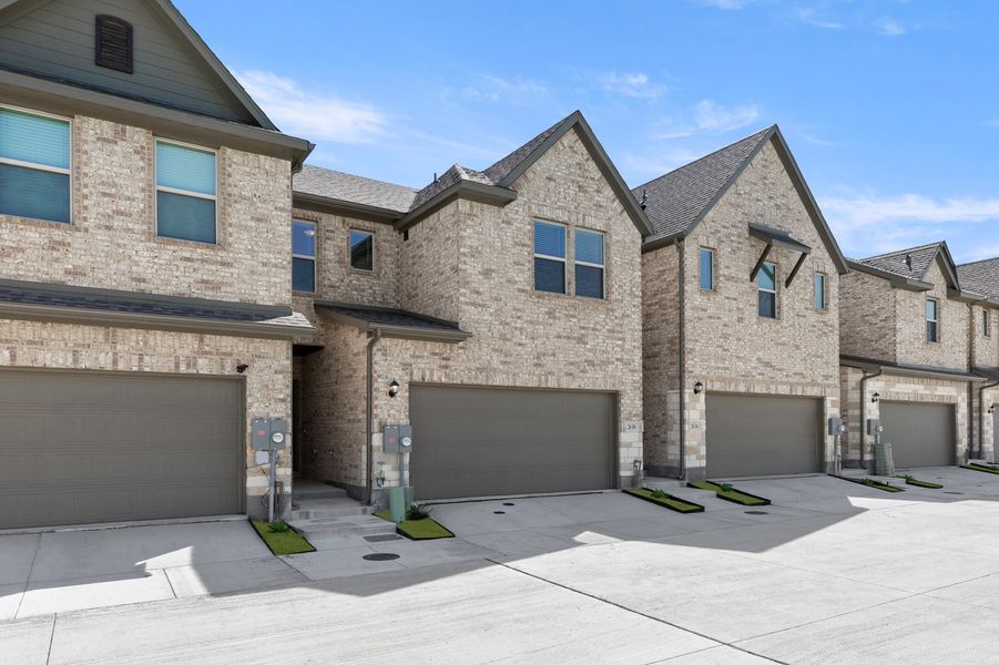 Front exterior of a new home in Sereno Oaks, Dallas, TX, highlighting curb appeal (Image 2). Front exterior of a new home in Sereno Oaks, Dallas, TX, highlighting curb appeal (Image 2).