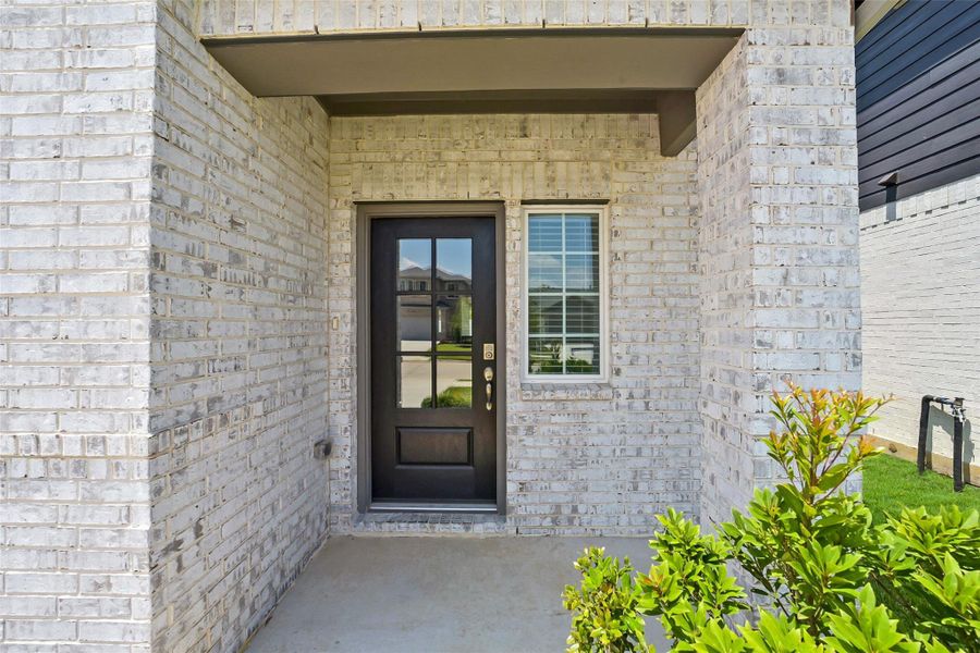 Exterior details and patio area of a home in Saint Tropez, Houston (Image 3). Exterior details and patio area of a home in Saint Tropez, Houston (Image 3).